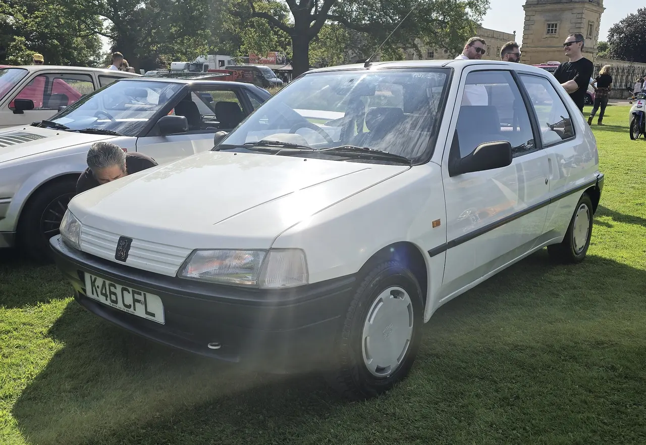 White 1993 Peugeot 106 XRD.