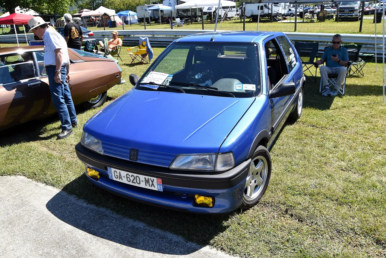 Blue 1992 Peugeot 106 XSi at a car show.